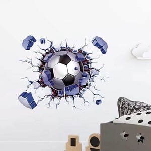 3D football wall decal showing a soccer ball breaking through wall for kids bedroom