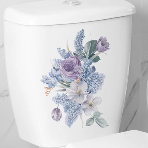 Romantic purple watercolor flower stickers for bathroom decor on white ceramic toilet