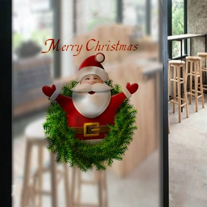 Detailed close-up of Merry Christmas Santa window sticker with a green festive wreath decoration