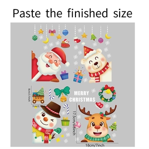 Detail view of Merry Christmas window decals showing Santa, snowman, and reindeer illustrations