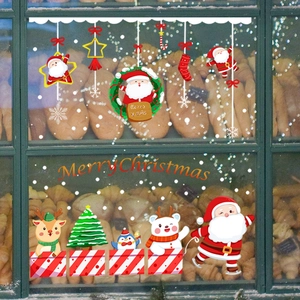 Christmas window decals set with Santa, reindeer and polar bear on glass shop window