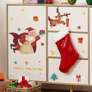 Cartoon Santa and reindeer Christmas wall stickers on a white cabinet for home decor