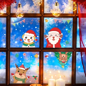 Festive Christmas window stickers featuring Santa, reindeer, and snowflakes on a cozy glass pane