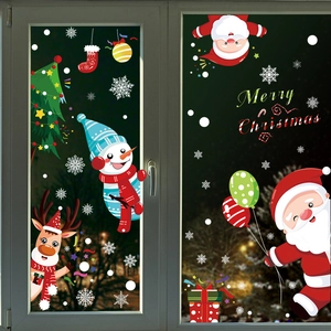 Christmas window static clings featuring Santa, snowman and reindeer on glass background