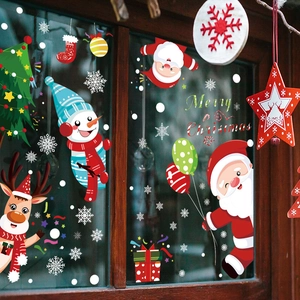 Christmas window stickers featuring Santa, snowman and reindeer on glass for home decor