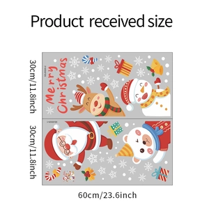 Detail view of two 30x60cm Christmas static window stickers with Santa and reindeer