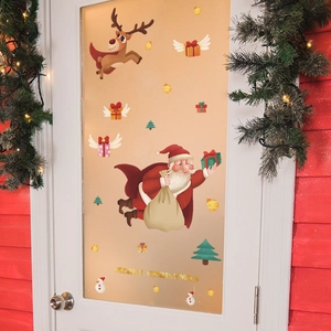 Detailed Christmas window stickers with Santa, reindeer and festive text on a glass door