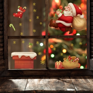 Détail de stickers de Noël pour fenêtres avec Père Noël, sucres d'orge et flocons de neige