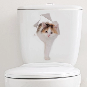 Detailed view of 3D calico cat sticker peering through a torn hole for toilet decor