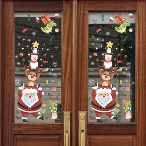 Christmas window stickers featuring cartoon Santa Claus, reindeer, and snowman on glass doors