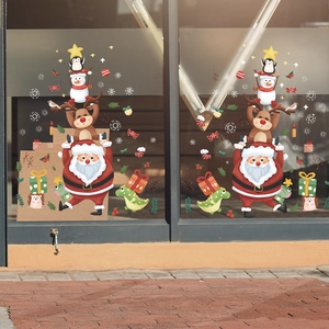 Detailed view of Christmas window stickers with Santa, reindeer and snowman stacking patterns