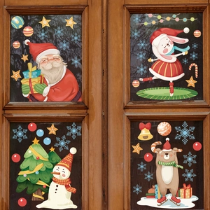 Festive Christmas window stickers featuring Santa Claus, snowman, and reindeer on glass