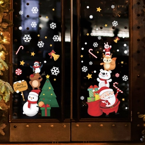 Weihnachtsfensteraufkleber mit Weihnachtsmann, Schneemann und Rentier an Glastür