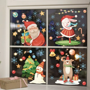 Christmas window decals with Santa, snowman, and tree on glass for festive decor