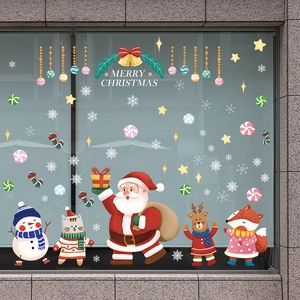 Cartoon Christmas window stickers featuring Santa, snowman, reindeer and Merry Christmas text