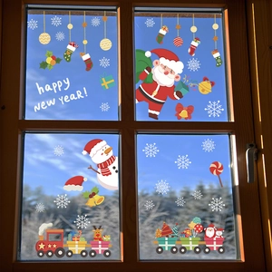 Detailed view of Christmas window static stickers with Santa, snowman and snowflakes
