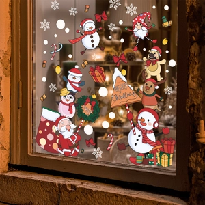 Detail showing self-adhesive Christmas window stickers with Santa, snowman and reindeer