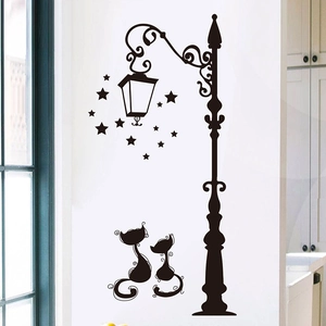 Creative wall sticker with black silhouette of a vintage street lamp and cats for home decor