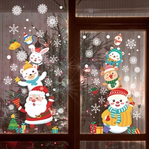 Christmas window decals with Santa Claus and snowflakes for festive glass decorations