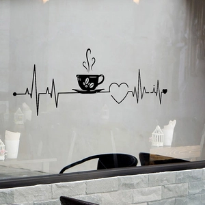 Detail of black vinyl coffee heartbeat wall sticker applied on a clear glass window
