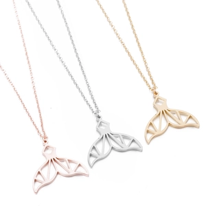 Three minimalist hollow mermaid tail necklaces in gold, silver and rose gold finishes