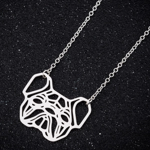 Hollow geometric pug pendant necklace in silver stainless steel on a black background