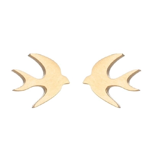 Detailed view of polished golden bird-shaped stud earrings on a clean white background