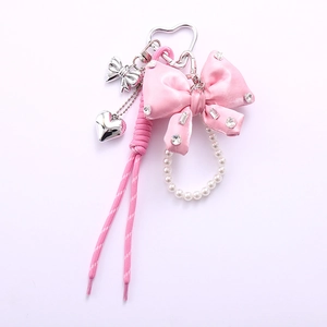 Pink ribbon bow phone charm with sparkling rhinestones, pearls and heart clip