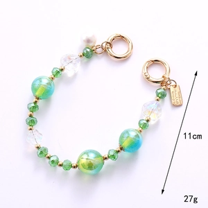 Colorful beaded heart phone chain with green crystal beads and golden carabiner clip