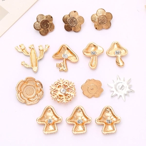 Assorted metallic floral and mushroom charms for DIY phone cases and shoes decoration