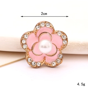 Sparkling 2cm pink floral shoe charm with white rhinestones and a central pearl accent