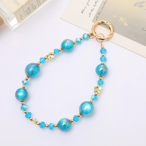 Blue mermaid bead phone charm wrist strap with golden butterfly accents and spring ring