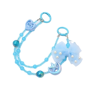 Blue crystal beaded phone charm with mesh bow and celestial star moon heart pendants