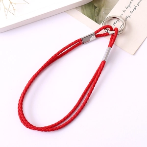 Red braided leather phone wrist strap with silver metal ring clasp on white background