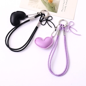 Braided heart charm strap for bags and phones in black and purple woven leather