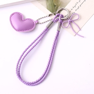 Lavender leather heart pendant with woven strap and silver metal keychain detail