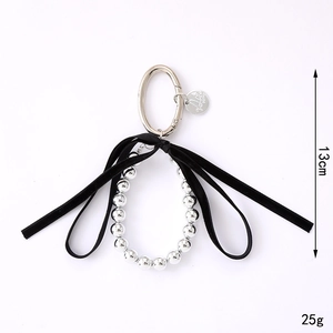 Silver UV beads keychain with black velvet bow and oval metal spring clip, 13cm height