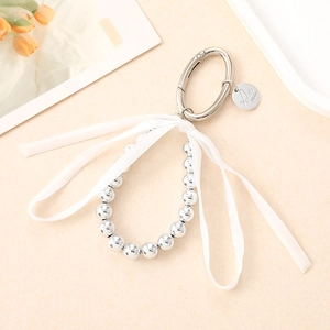 Silver bead keychain with white ribbon bow and spring clasp for handbag charm
