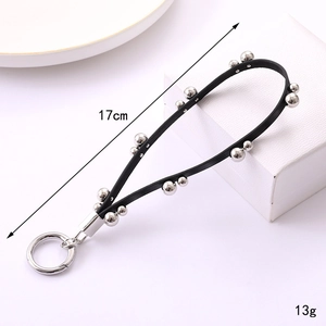 Punk style black leather strap keychain with silver rivets and spring ring clasp, 17cm long