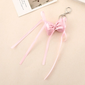 Pink ribbon bow keychain with long silk streamers and silver metal lobster clasp