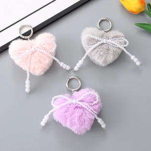 Plush heart keychains with pearl bows in pink, grey and purple colors for handbags
