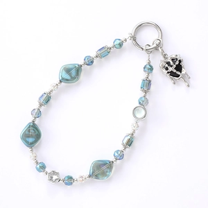 Iridescent beaded keychain with rose-shaped charms and a silver fluid heart pendant