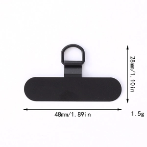 Detailed view of the black metal phone tether tab with its exact product dimensions