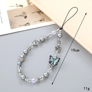 Bijou de téléphone élégant avec papillon bleu, perles grises et étoiles, 19cm de long