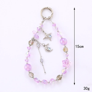 Dreamy crystal star and moon beaded phone strap in pink and purple with silver charms