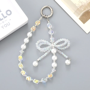 Pearl phone charm with iridescent crystal bow and silver metal clasp for handbags