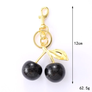 Creative black cherry resin keychain with gold leaf, 12cm height and 62.5g weight accessory