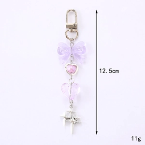 Y2K purple bow and star keychain with resin heart charms, 12.5cm long and 11g weight