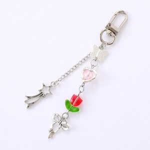 Y2K keychain with silver stars, pink heart, tulip charm and bow pendant on metal chain