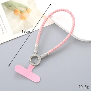 Pink braided leather phone strap with sparkling rhinestone ring and mounting pad